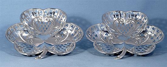 A pair of Edwardian silver “shamrock” sweetmeat dishes,